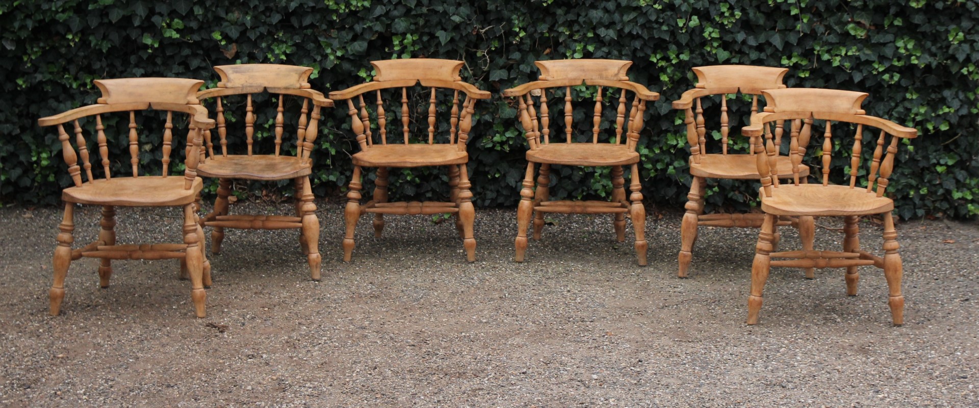antikes-set-aus-6-captain-chairs-aus-holz